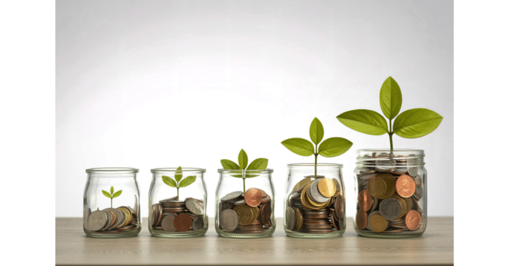 Five glass jars filled with increasing amounts of coins and growing plants, symbolizing how you can grow business and investment while nurturing financial and regenerative wellness.